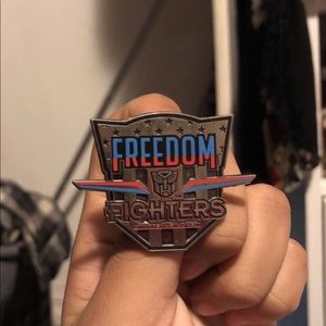 Transformers enamel pin